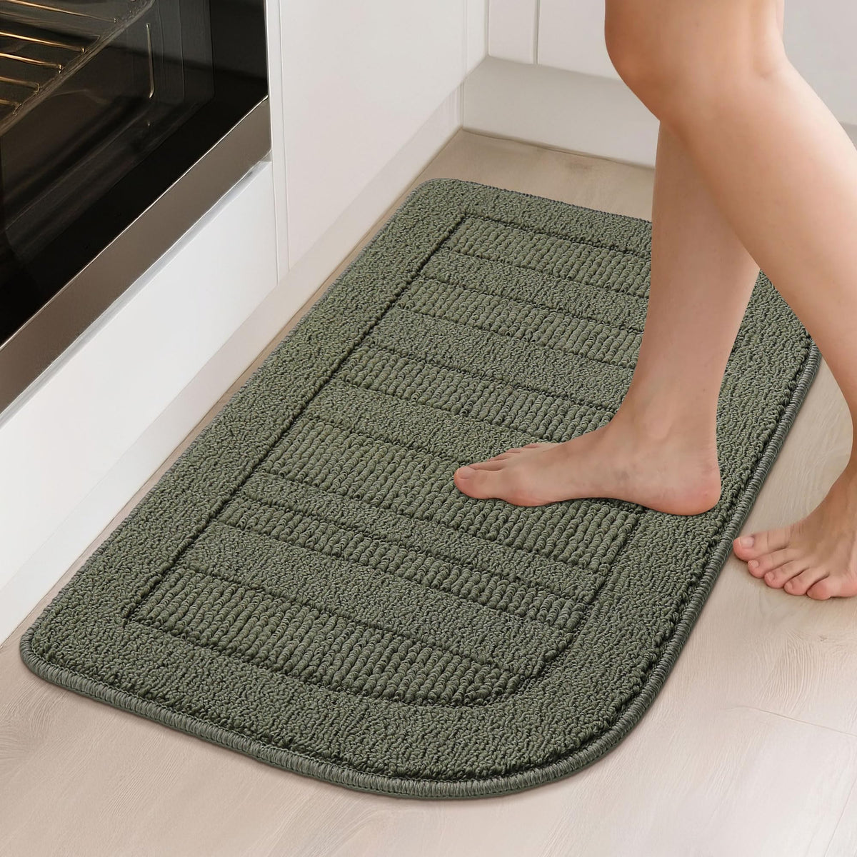 BEQHAUSE absorbent kitchen mat protects floors from spills while cooking.