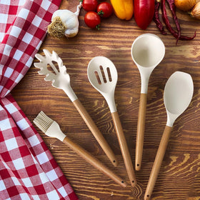 BESTZMWK kitchen utensil holder keeps tools organized on the counter.