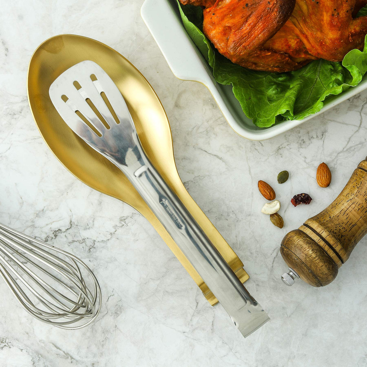 BETTWILL Gold Spoon Rest enhances a luxe kitchen display while staying functional.