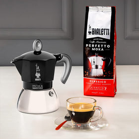 Handle and moustache logo detail on Bialetti Moka Induction