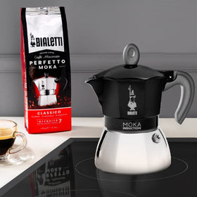 Bialetti Moka Induction on the stovetop, compatible with induction hobs and other heat sources.