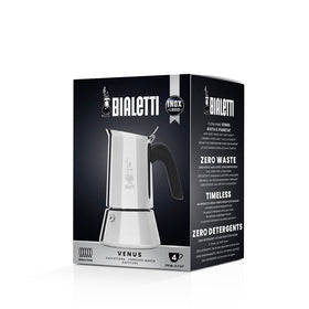 Bialetti Venus handle close-up highlighting ergonomic grip for safe pouring