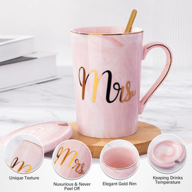 Ceramic mugs with lids and spoons included in the set.