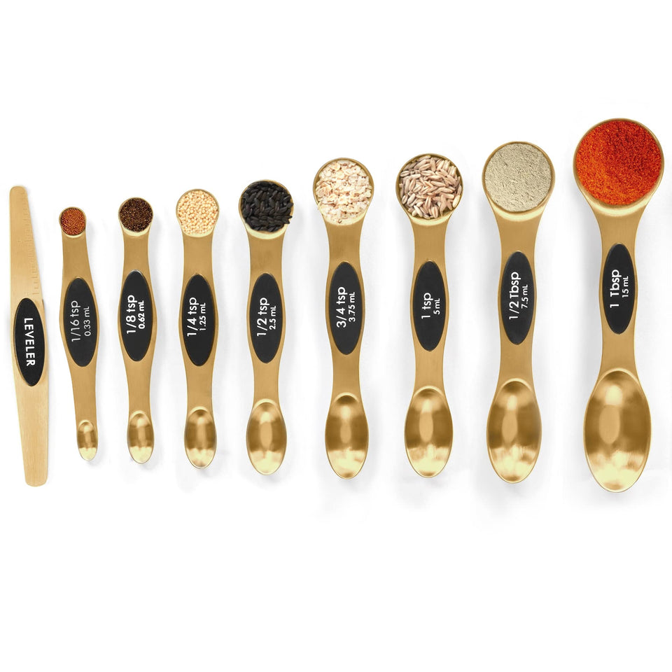 Bidful magnetic measuring spoons set in a drawer, space-saving nesting for easy storage.