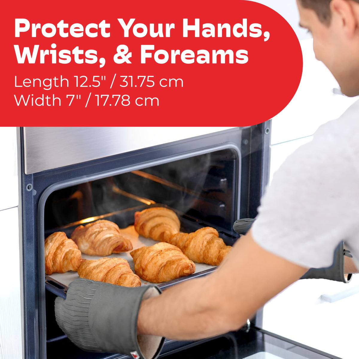 Big Red House professional-grade gray kitchen gloves shielding hands up to 280°C during baking.