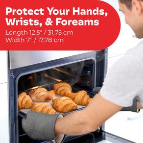 Big Red House professional-grade gray kitchen gloves shielding hands up to 280°C during baking.