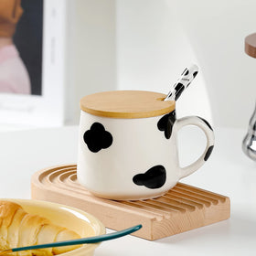 BigNoseDeer cow-decor mug makes a playful desk accessory.