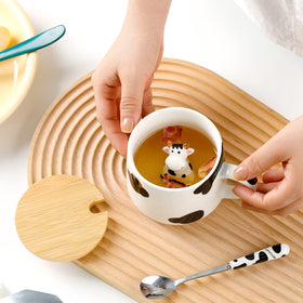 BigNoseDeer cute ceramic mug with lid-spoon for everyday use.