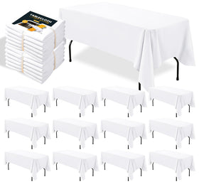 BIGTONE 12-pack white rectangle tablecloth on a 6 ft table for elegant events.
