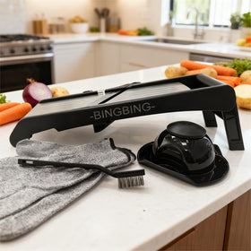 -BINGBING- mandoline base with silicone wrap stays steady on the counter.