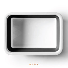 BINO collapsible wash basin being used for soaking dishes or laundry.