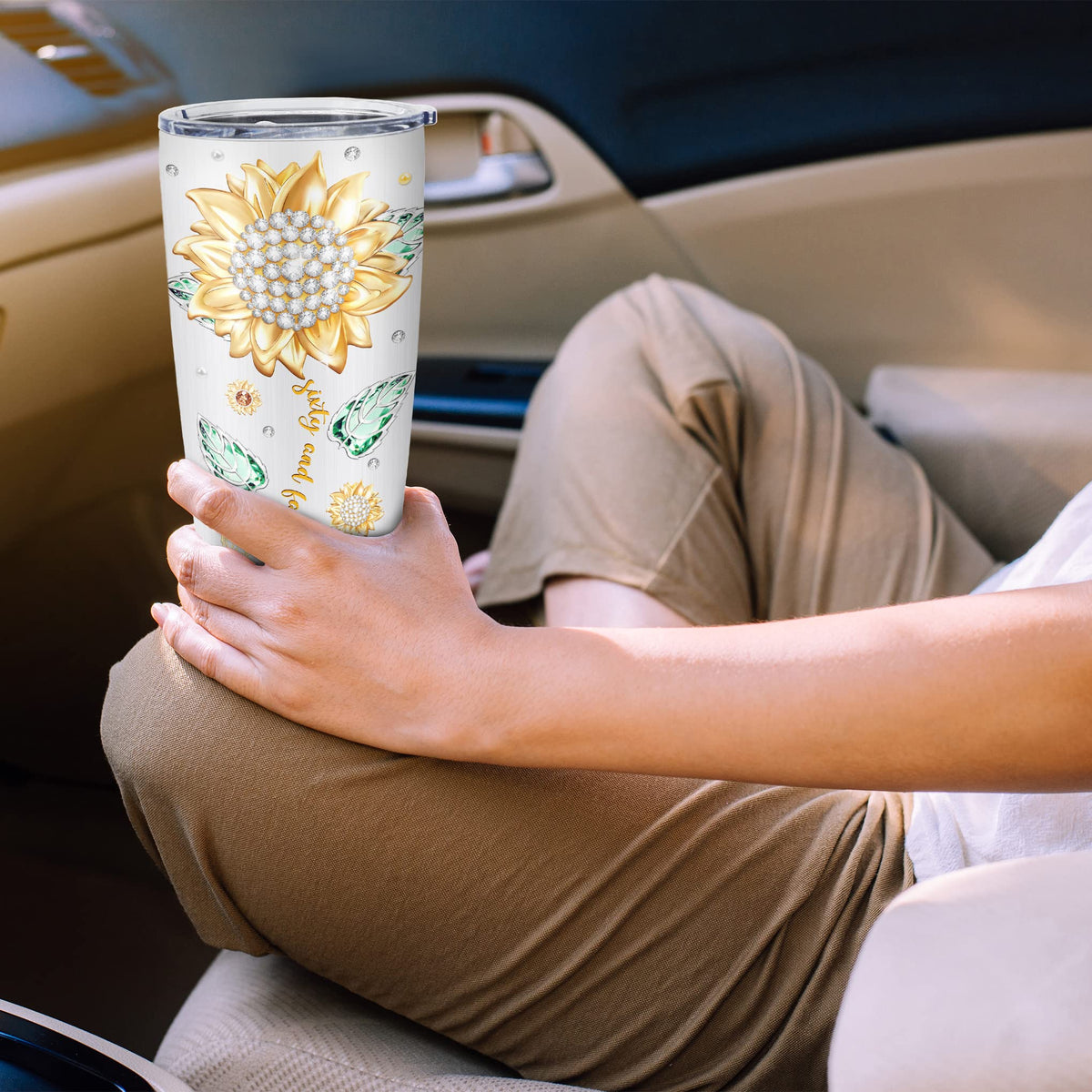Biomlon tumbler in hand during travel, versatile for outings.
