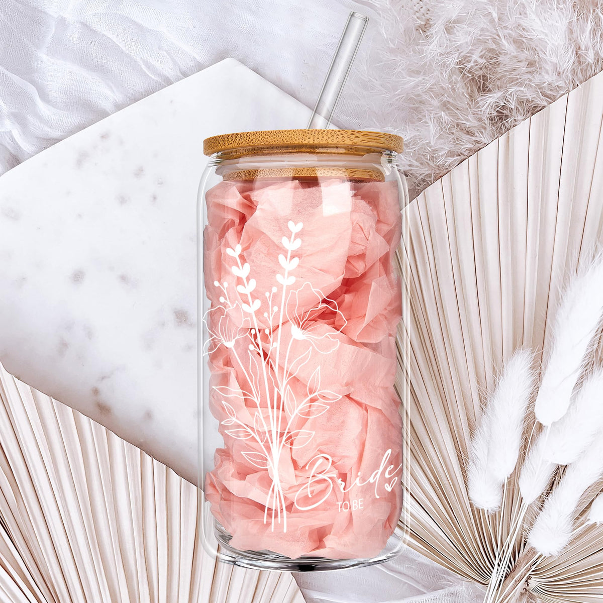 BIPEDS glass cup includes a reusable straw for eco-friendly sipping.