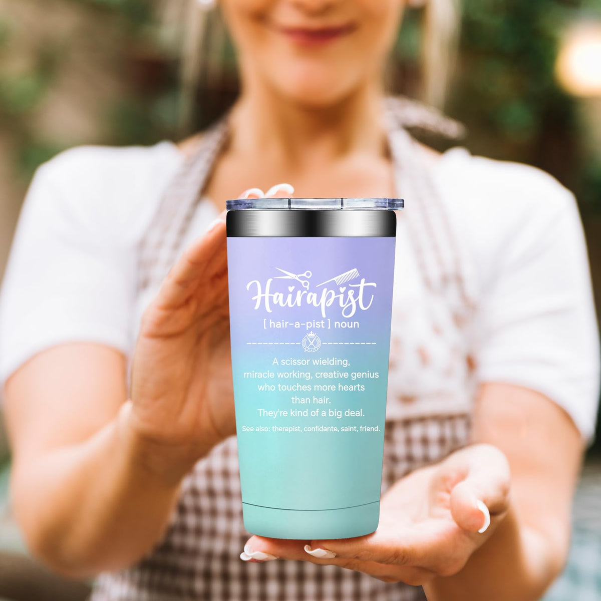 BIRGILT Hairapist tumbler held during a salon day on the go