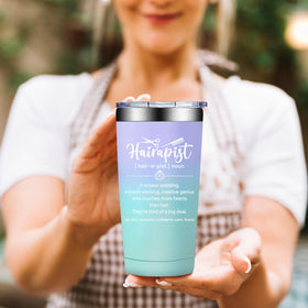 BIRGILT Hairapist tumbler held during a salon day on the go