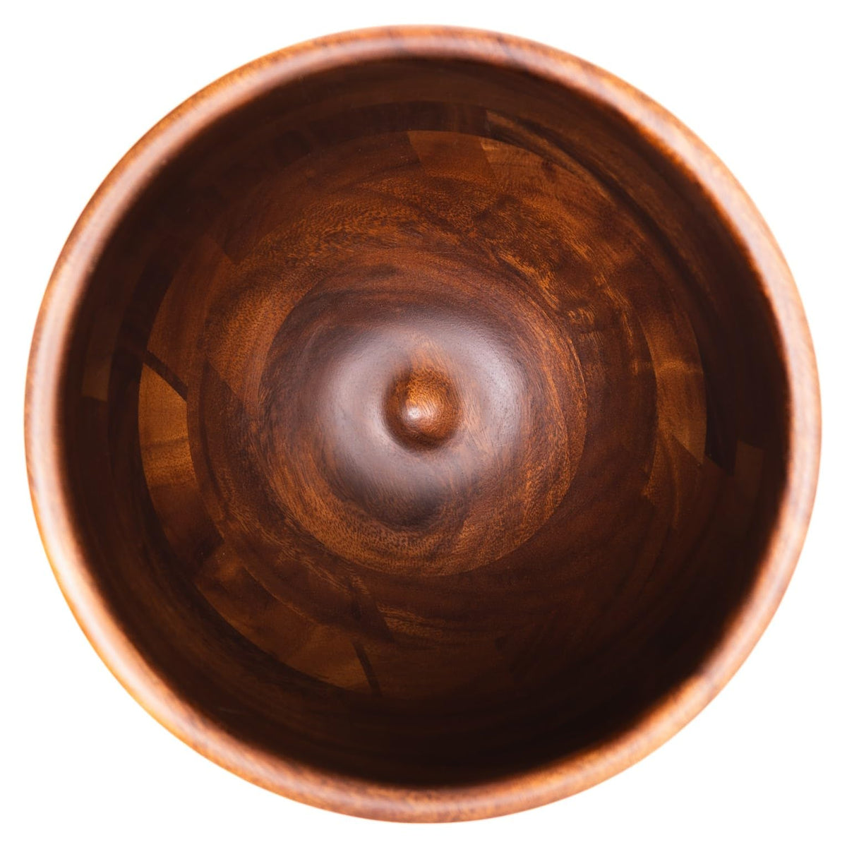 Biscuitique walnut bowl close-up highlights smooth grain and refined edges.