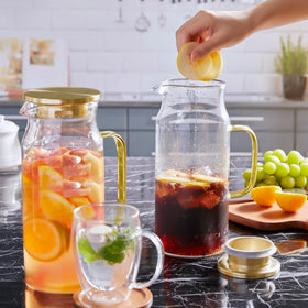 Bivvclaz 68 oz pitcher fits in fridge with beverages.