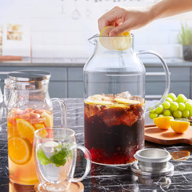Bivvclaz pitcher being held with a comfortable handle for easy pouring.