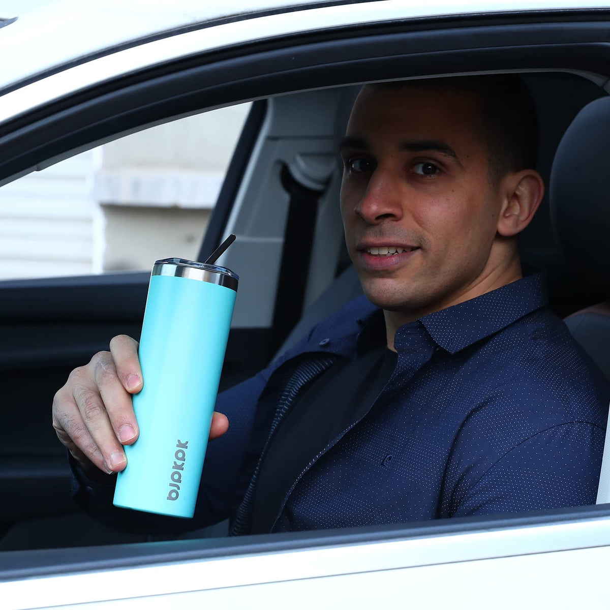 BJPKPK turquoise vacuum-insulation tumbler preserves hot or cold drinks for hours.