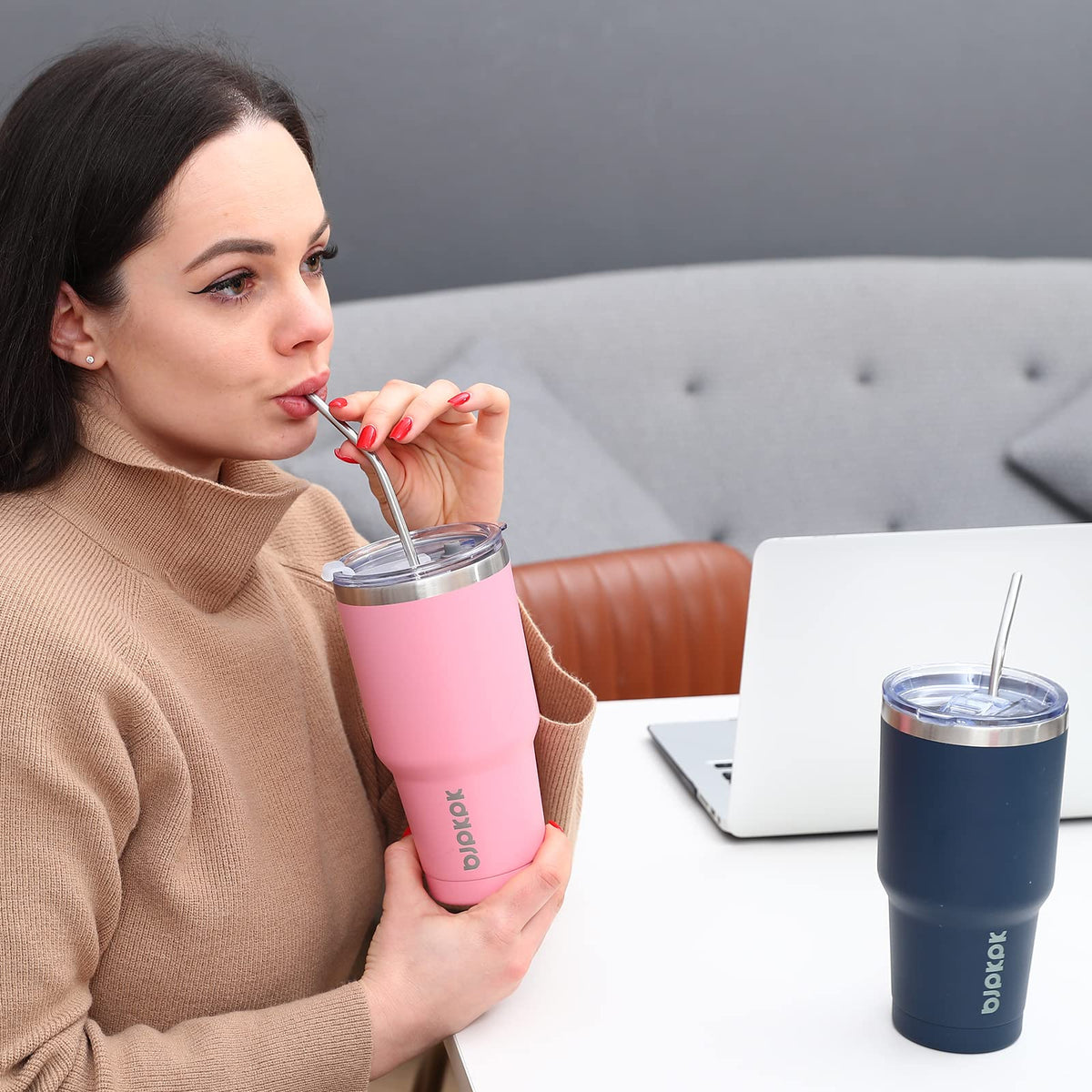 BJPKPK 30 oz tumbler with powder-coated finish stays dry and neat while held.