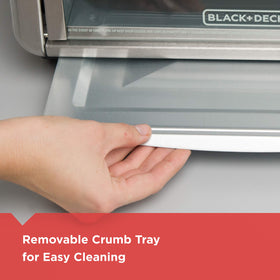 Removable crumb tray on the BLACK+DECKER toaster oven for easy cleanup