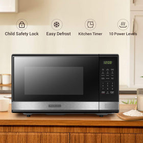 Digital display panel shows clock and timer for precise, convenient cooking.