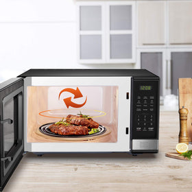 Stainless steel door frame and black enclosure add a professional touch to kitchens.