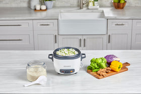 Steaming basket in the BLACK+DECKER RC516 enabling healthy veggie and fish meals