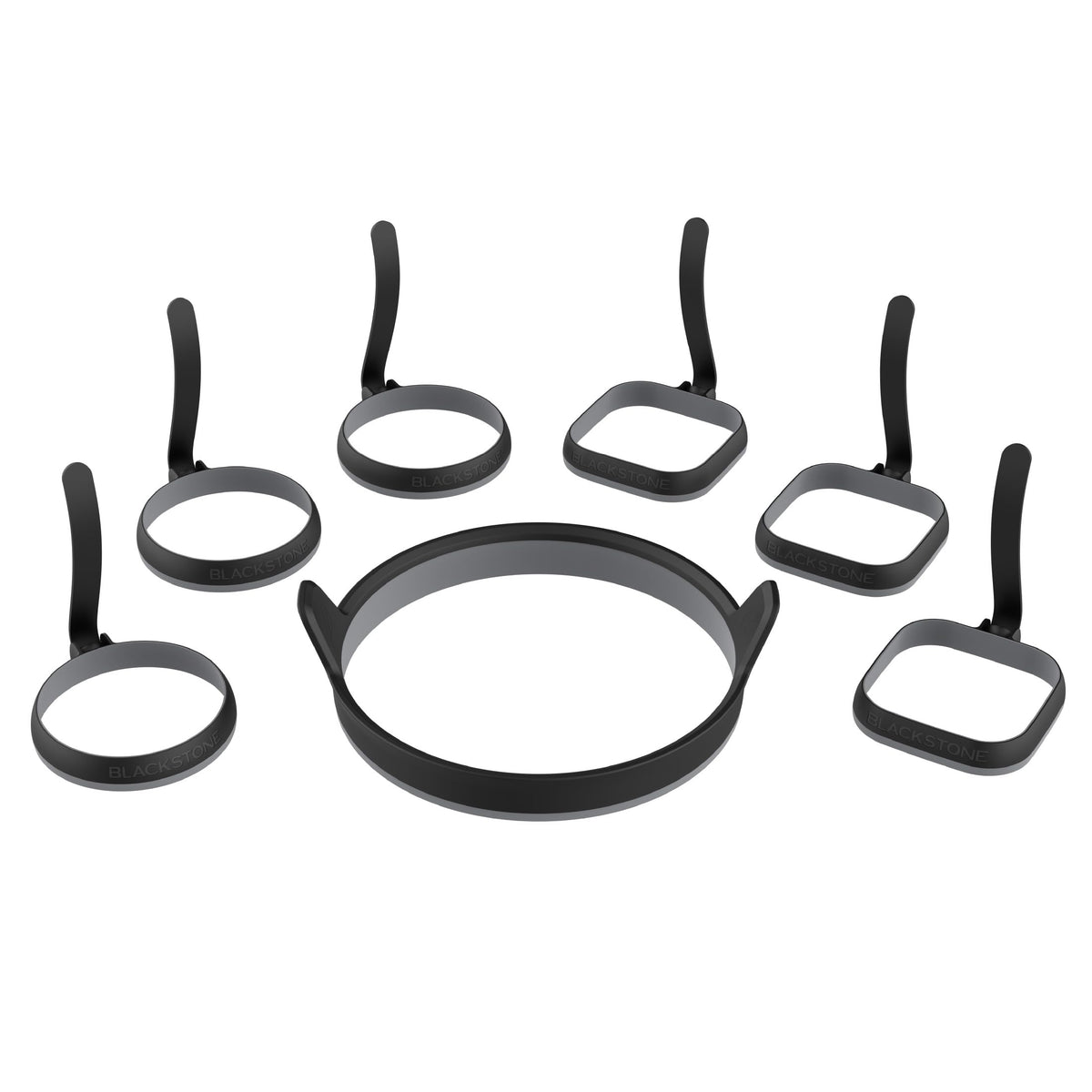 Blackstone egg ring kit on griddle delivering perfectly round eggs.