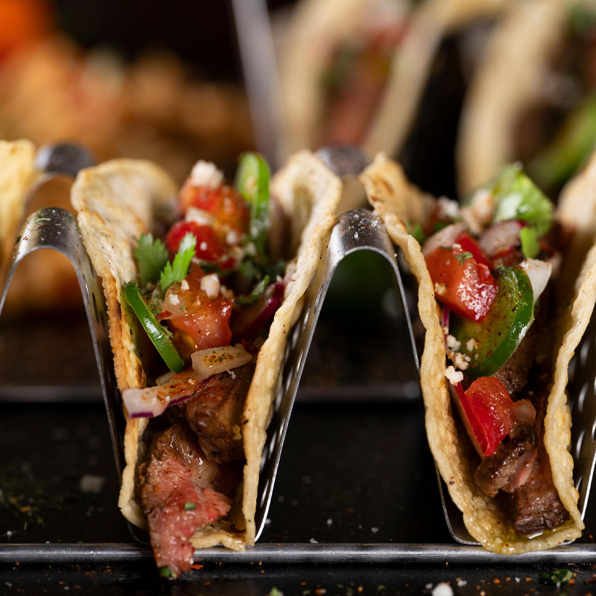 Blackstone taco stand deployed on counter to keep tortillas neat during prep