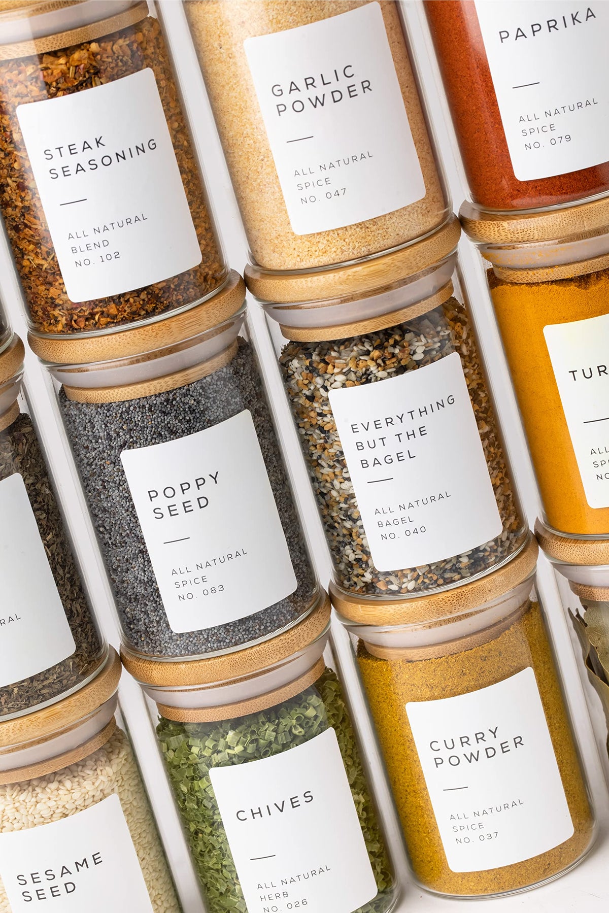 Bloomondo empty spice jars with bamboo lids, close-up of airtight glass storage.