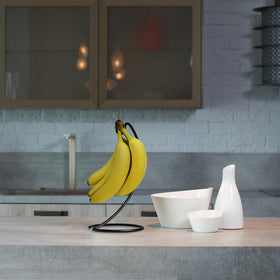 Blue Donuts banana hanger fits most countertops without crowding the space.
