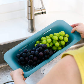 BLUE GINKGO colander holes prevent clogs while draining.