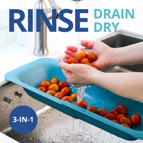 BLUE GINKGO extendable colander over sink with ample draining space.
