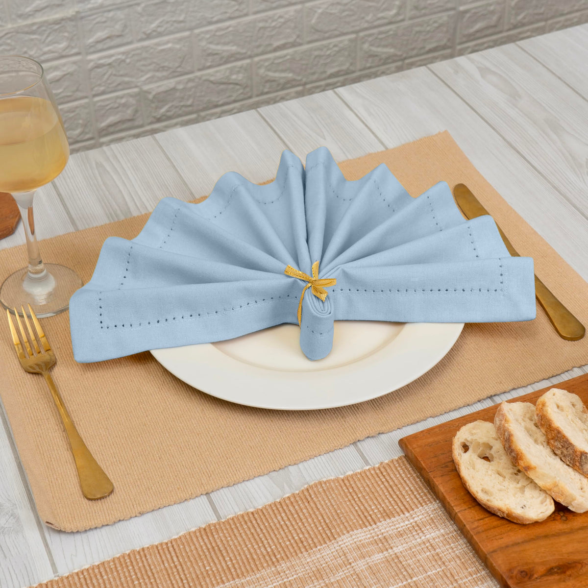 Blue Needles dining napkin soft cotton offers comfort and dependable absorbency.