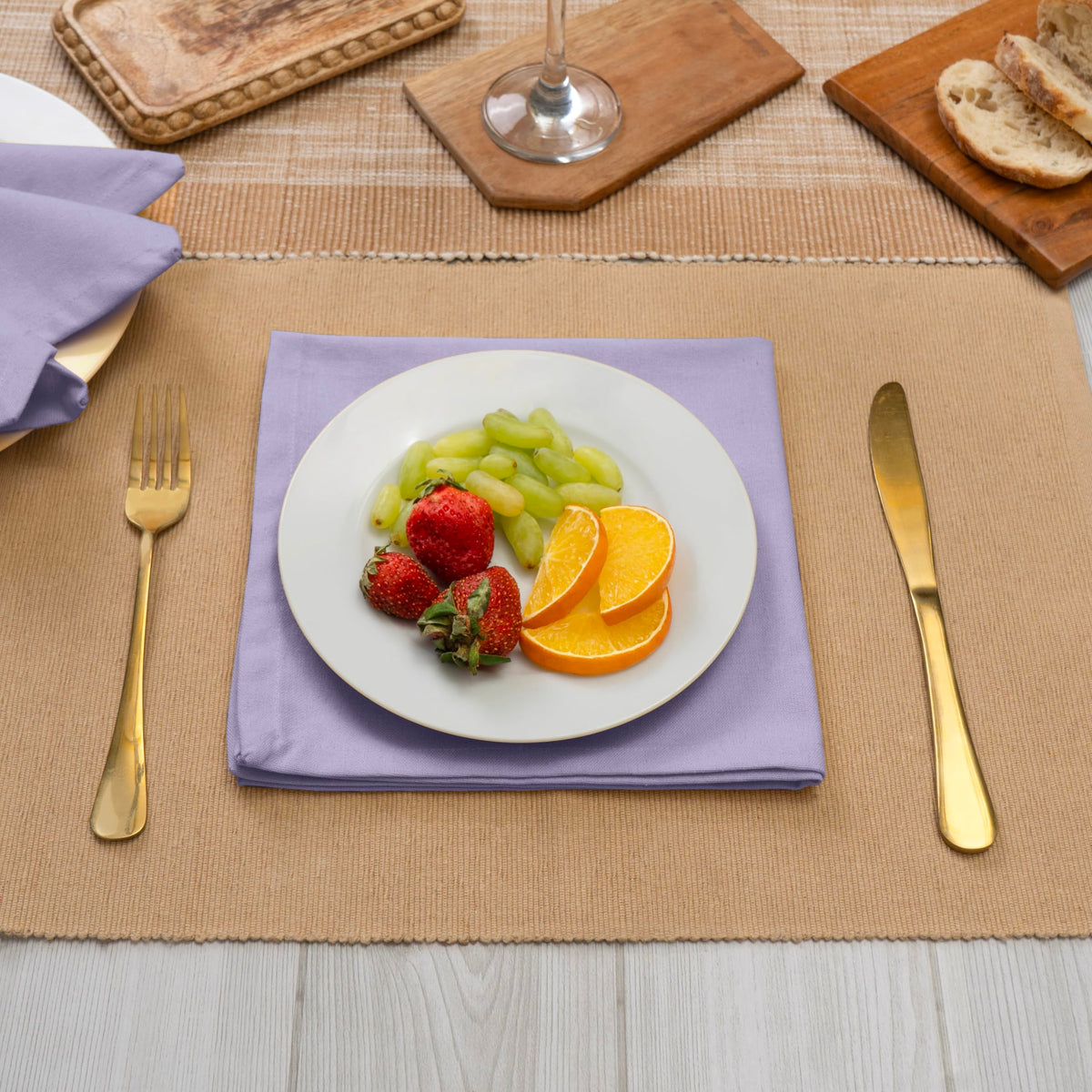 Blue Needles lavender napkins folded neatly for stylish place settings.