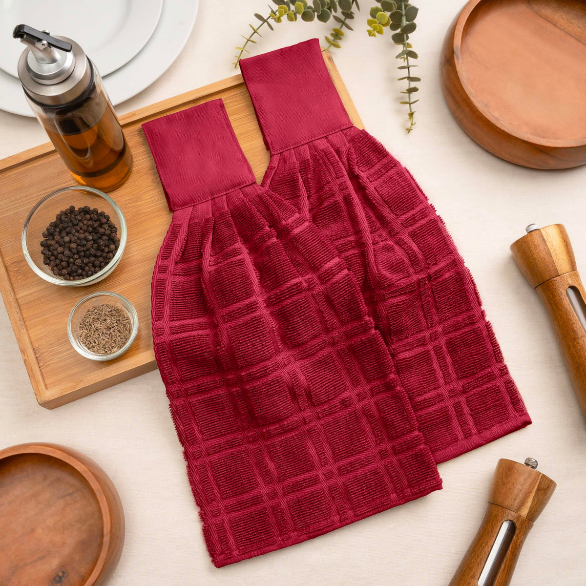 Blue Needles red towels drying dishes and wiping surfaces efficiently.