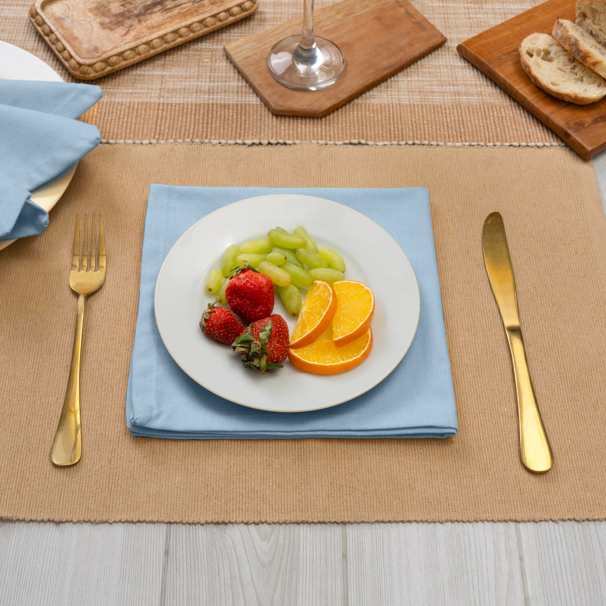 Blue Needles table setup with ice blue napkins for elegant dining