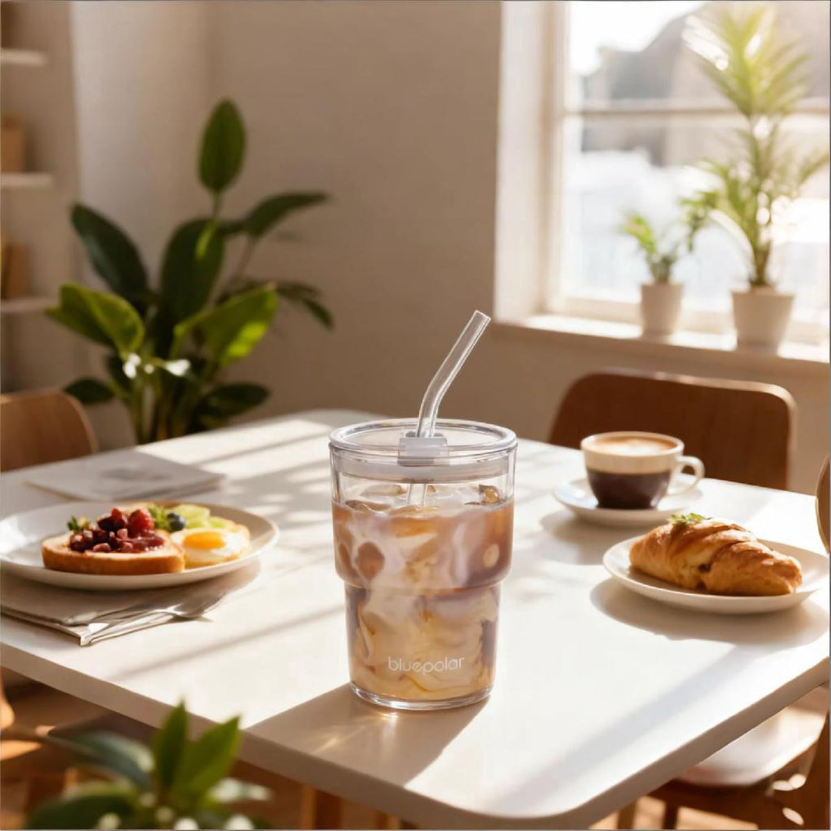 BLUEPOLAR glass tumbler with straw and lid, convenient sipping and leak-proof design.