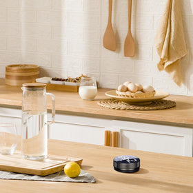 BlueSnail timer in a kitchen and gym setting demonstrating versatile use.