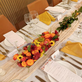 BLUETOP boho sheer gauze table runner adds breezy charm to summer celebrations.