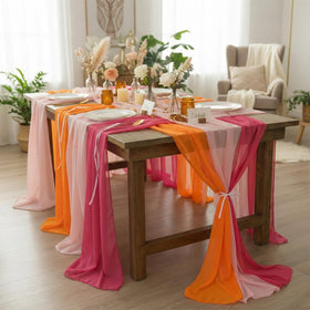Boao wedding reception table setup with chiffon runners and soft lighting