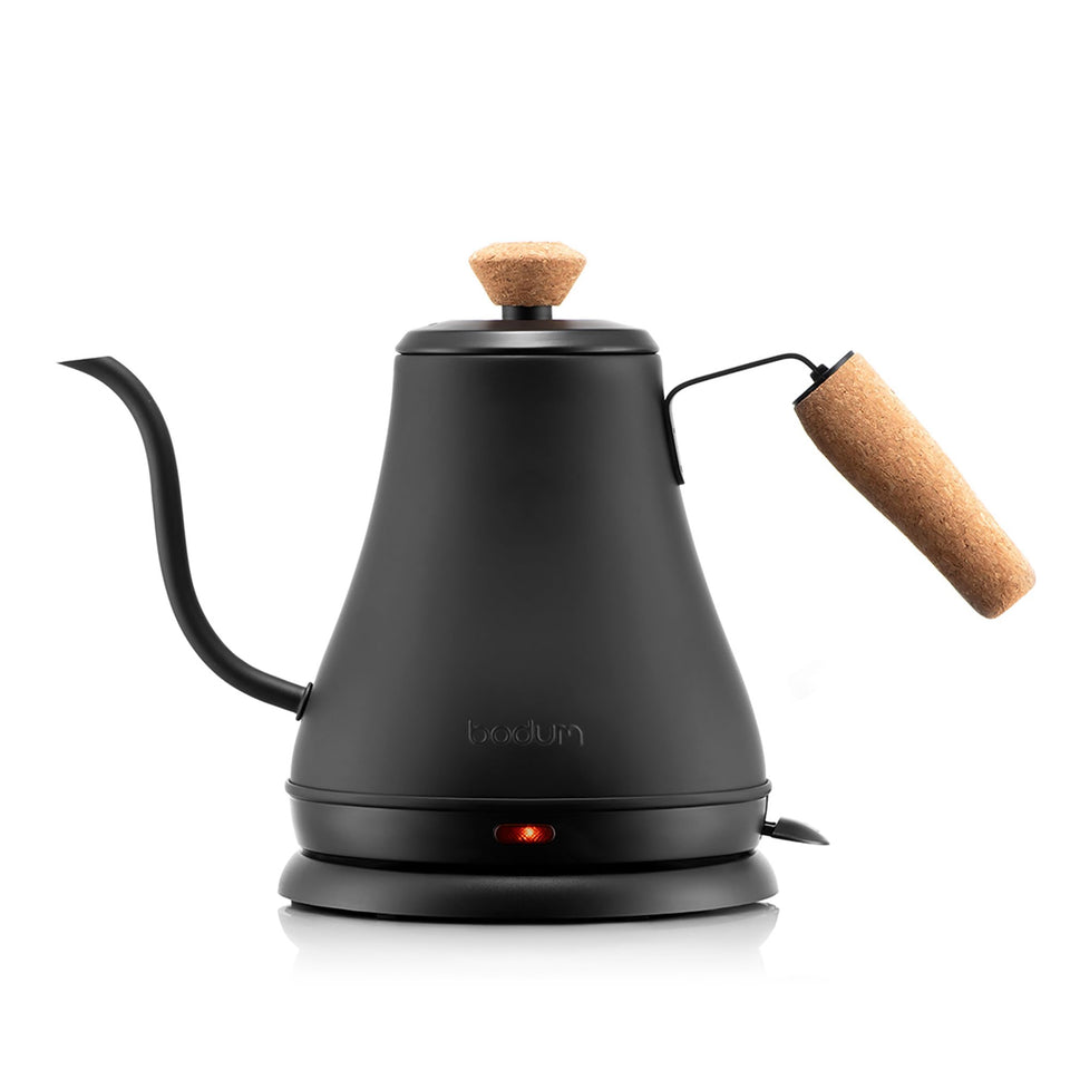 Bodum Bistro gooseneck kettle pouring with precision for even brew.