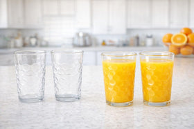 BOHEM'S clear glass cup in hand demonstrates comfortable grip and balanced weight.