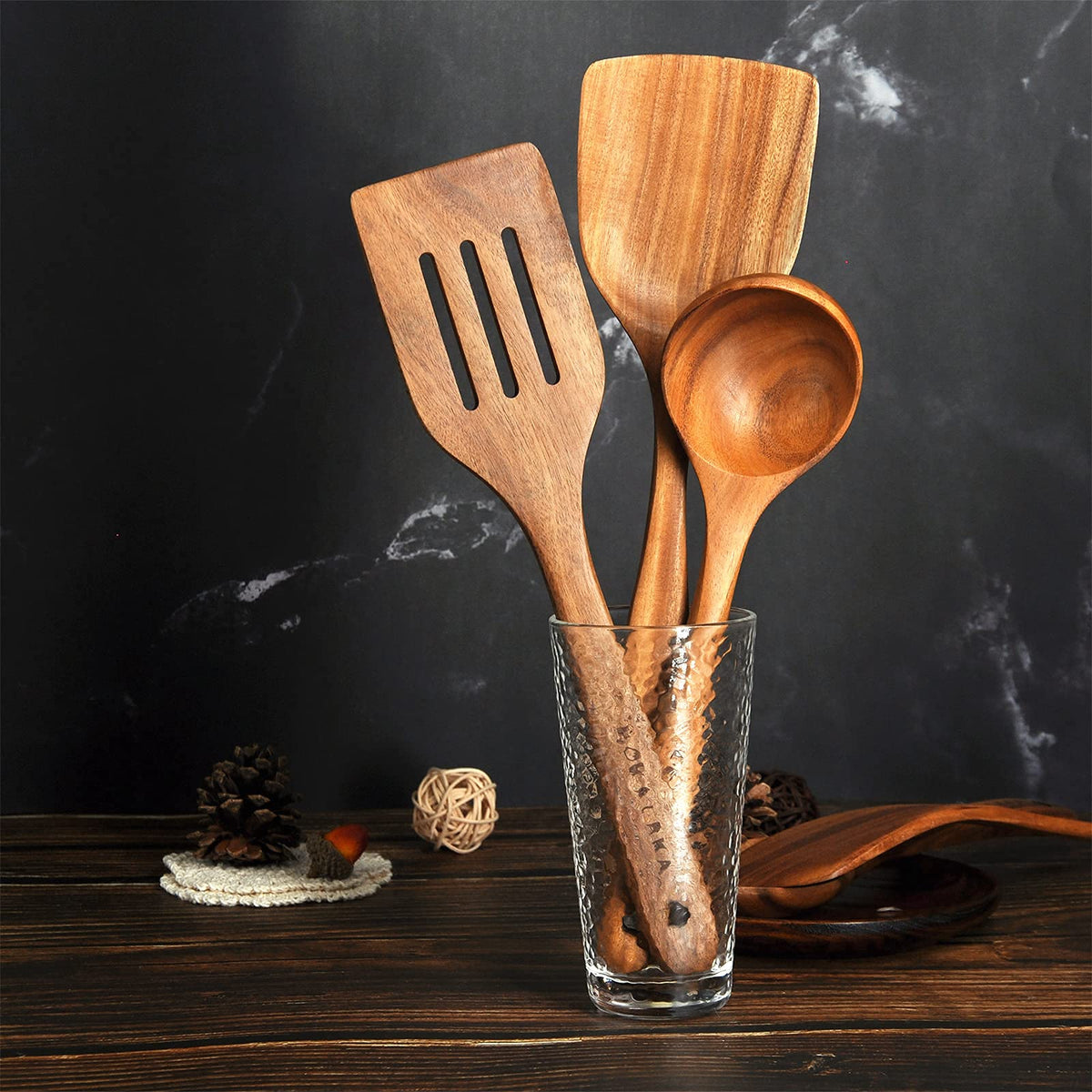 BOKALAKA teak-spaghetti-spoon stirs and serves pasta with ease.