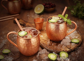 Bold and Divine barrel-shaped copper mug for classic cocktails and stylish gatherings.
