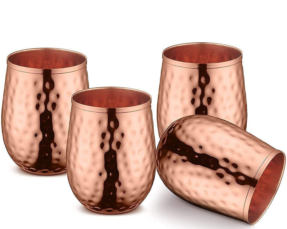 Bold & Divine copper cups four-pack with hammered finish for elegant entertaining.