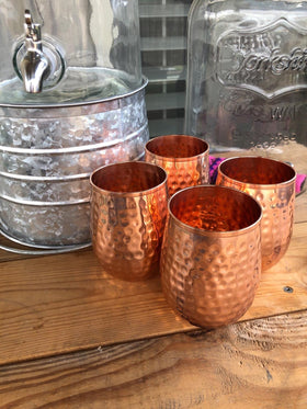 Table setting featuring Bold & Divine copper cups for versatile tableware.