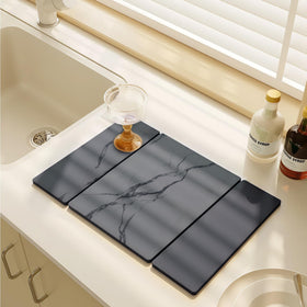 BOMOKS collapsible drying mat folded for compact storage