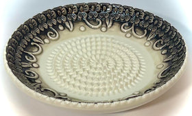 BonCera plate closeup shows durable, dishwasher-safe ceramic construction.